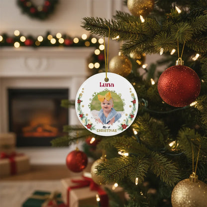 Personalized Christmas ornament on a decorated tree with festive background