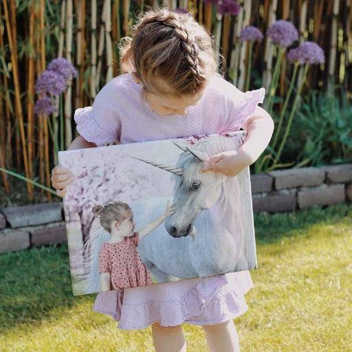 Customer holding Pink Unicorn portrait 4